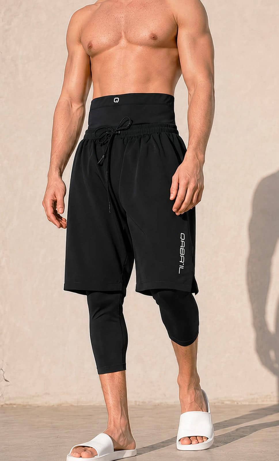 Sarouel de bain homme noir sur la plage